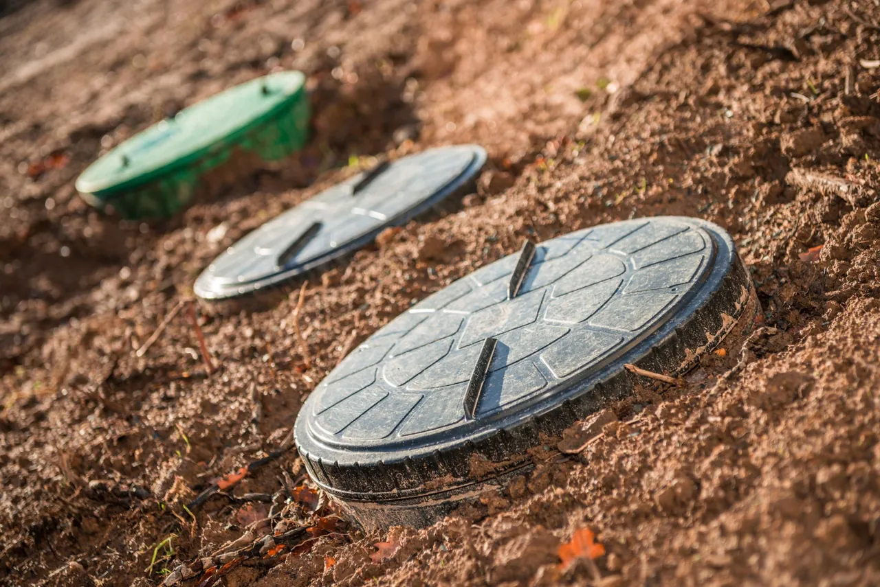 Septic system access covers